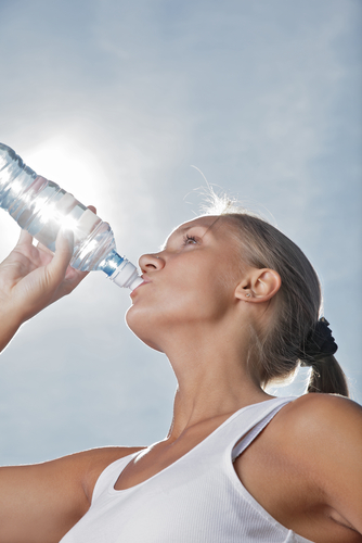 girls drinking water bottle