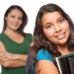 Teen girl and mom empowering girls