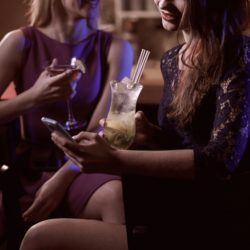 tipster women at bar nightclub