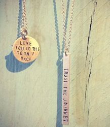 Hand-etched necklaces from Blush.