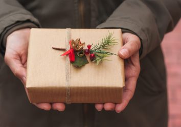 Woman holding a Christmas gift