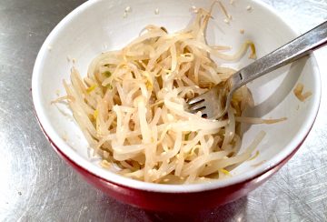 Bean sprouts with sesame oil and sesame seeds.