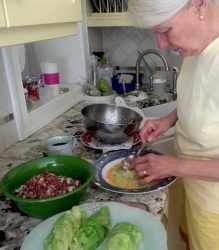 Mom making cabbages. She begged me not to take a photo. Oh well.